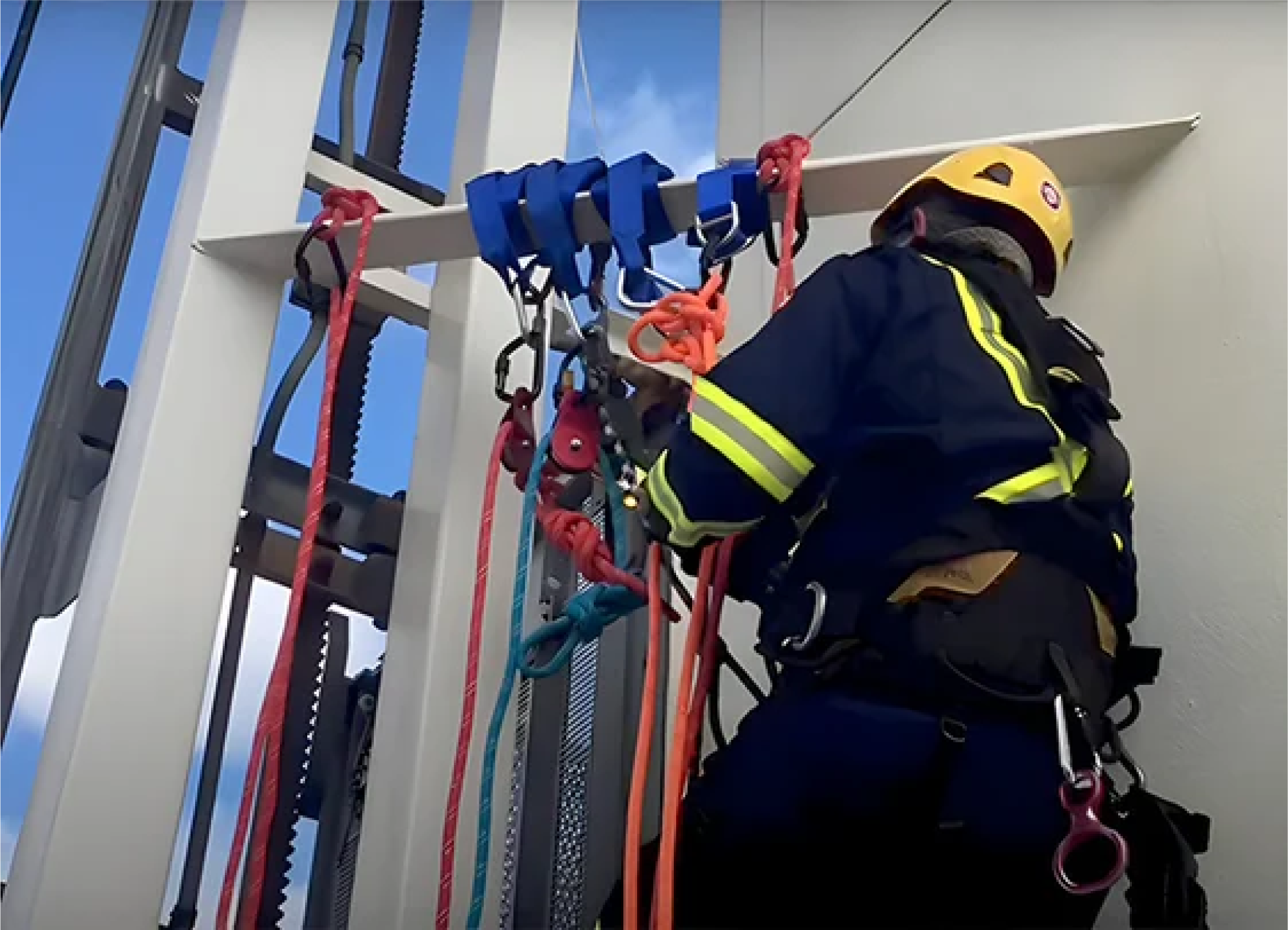 3 - Rope Access Teams Utilizing Rope & Carbiners to Climb